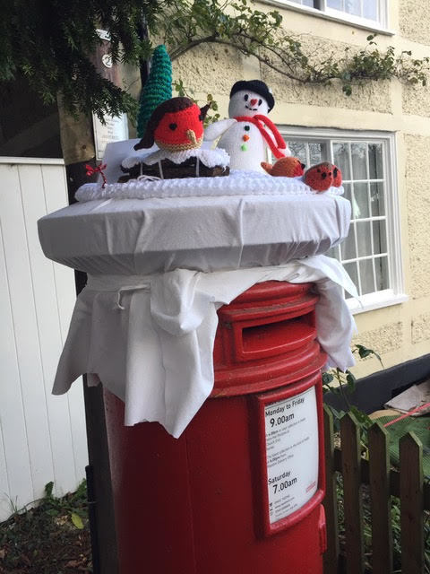 Christmas scenes on Church End postbox